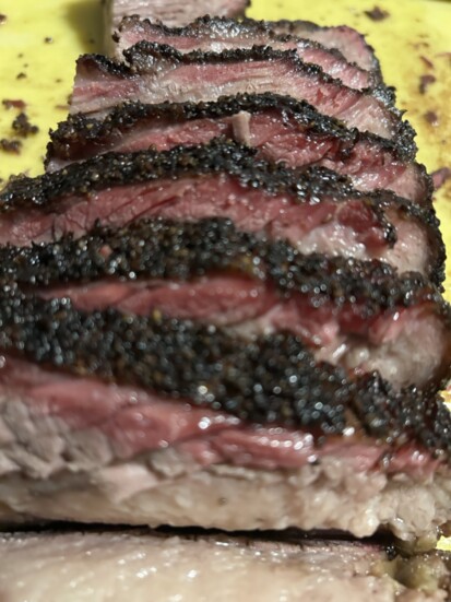 Chef's brisket with a perfectly pink smoke ring.