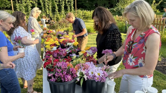 Wendy and Steve Wooters host a Flower Power Garden Party