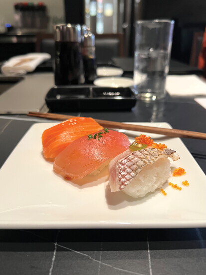 The Sushi Set with bluefin tuna sashimi,albacore, ora king salmon and seabream nigiri.