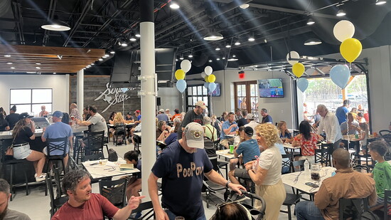 Capacity crowd in the Tap Room spills out onto the Patio.