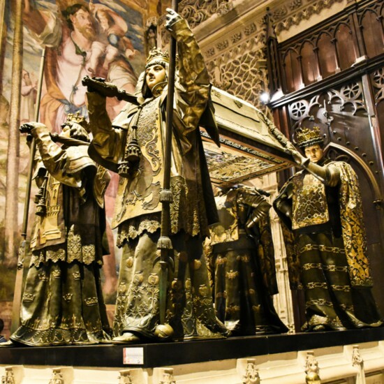 The dramatic tomb of Christopher Columbus is found in Seville Cathedral. It is the fourth largest church in the world, and the largest Gothic church.