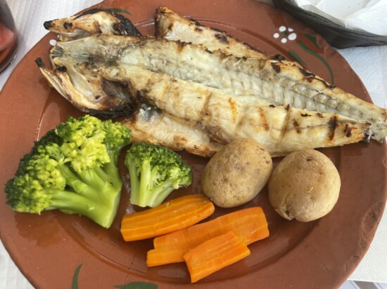 Sea bass, sea bream and sardines, cooked on spits, are popular dishes at beachside restaurants on the Costa del Sol.