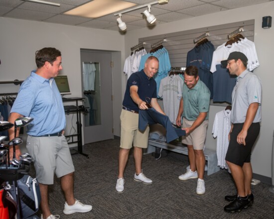 Golfers Zach Piper, Joe Goelzhauser, Jeff Bennett and Austin Shadle enjoy shopping in the Bluegrass pro shop.