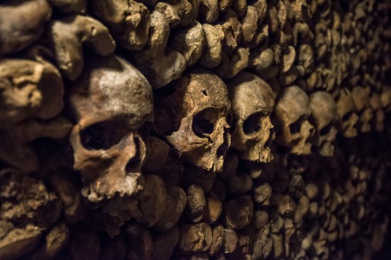 Skulls and bones in Paris Catacombs.