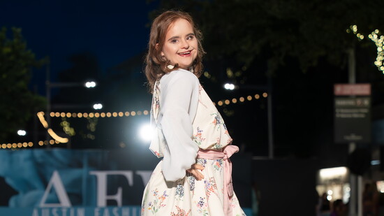 Cristina walking the runwayat Austin Fashion Week 2025. Image courtesy of Austin Fashion Week.