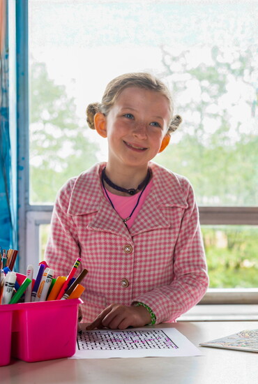 Art is Fiona’s favorite subject at Springer—pink is her signature color