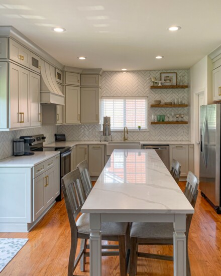 A completed kitchen remodel shows off the farmhouse look.