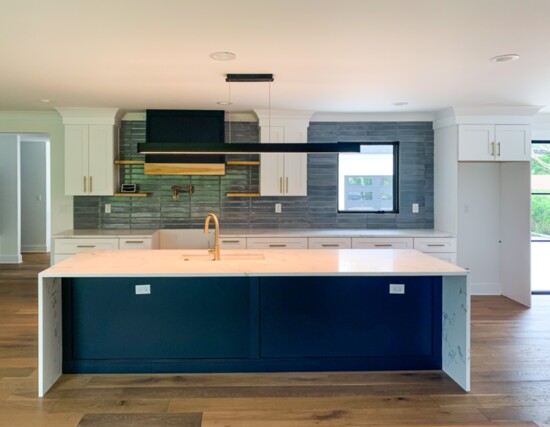 A customer's kitchen is remodeled using current color themes.