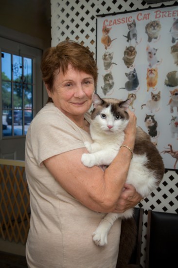Marlene Mullen, Secretary of the Board, with Bud. Bud is a cancer survivor, and Marlene has adopted him and brought him back to health.