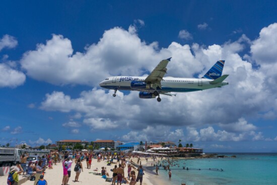 Try to catch a jet plane at Maho Beach