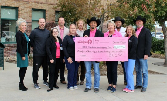 The Greeley Stampede donated over $26,600 to the NCMC Foundation's Breast Cancer Patient Support Fund as part of their Tough Enough to Wear Pink campaign.