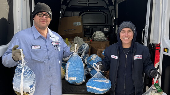 Standard Heating team participating in a turkey drive.