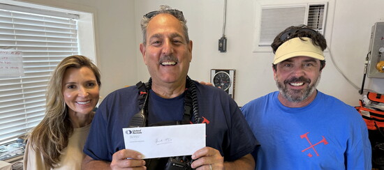 Steve Vinklarek with his wife, Jennifer Rueter Vinklarek,  supporting Hunt Volunteer Fire Department relief efforts.