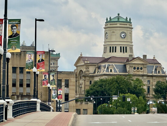 A view of the clock tower from the bridge. This is the third version to crown the stately building.