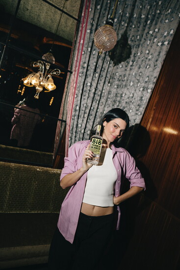 Kendall Jenner and her 818 Tequila at Delilah | Photographer: Sophie Sahara