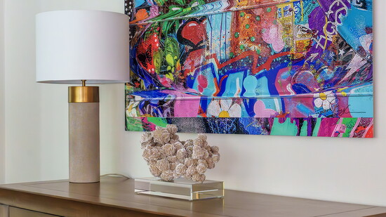 A joint collaboration with a graffiti artist, this artwork brightens up an otherwise plain wall. Art by Suzann Kaltbaum. Photography by Modern Media LLC