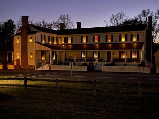 Hanover Tavern with candles in the windows. Photo Credit: David Deal