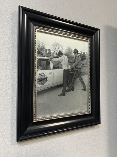 Photo of Steve Harp making an arrest as a patrol officer