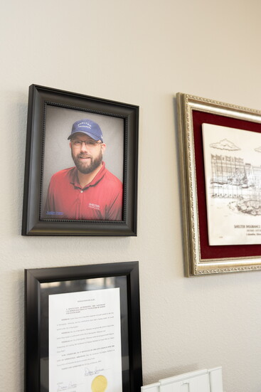 Photo of Justin Harp, hanging on the wall outside Steve's office