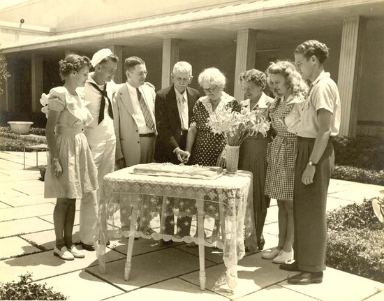 Lillie Pierce Voss and Capt. Frederick Voss mark their 50th wedding anniversary in the Norton courtyard, 1944—where her parents are buried. At far right, 18-yea