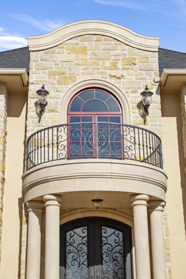 Pillars of cast stone add elegance to this Oklahoma City home.