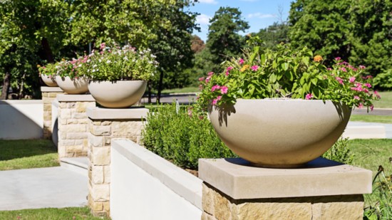 Even simple planters become elegant in cast stone.