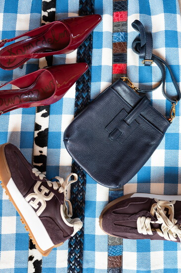 Accessories that are in the same conversation, but aren’t saying the same thing. Lansky Bros.