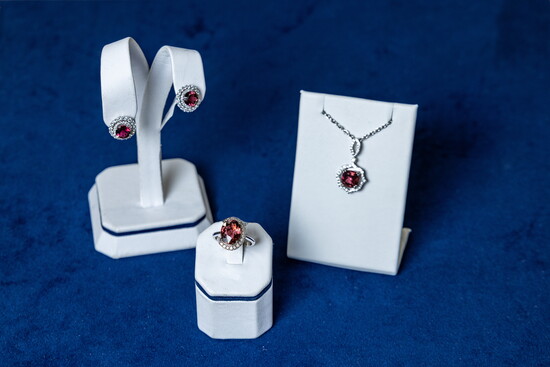 Earrings, ring, and necklace in pink tourmaline and diamonds.