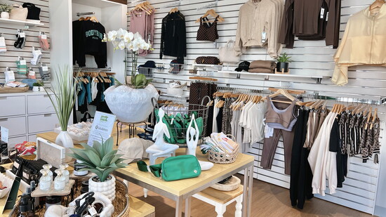 The retail boutique at BODYBAR Woodforest features high quality athleisure and accessories curated for members.