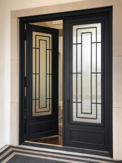 # 1 Iron worked doors add both visual appeal and light.