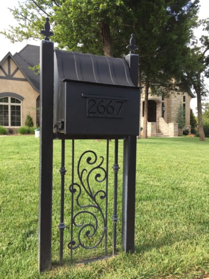 Wrought-iron mailboxes make a statement of sophistication and elegance to the front of a home.