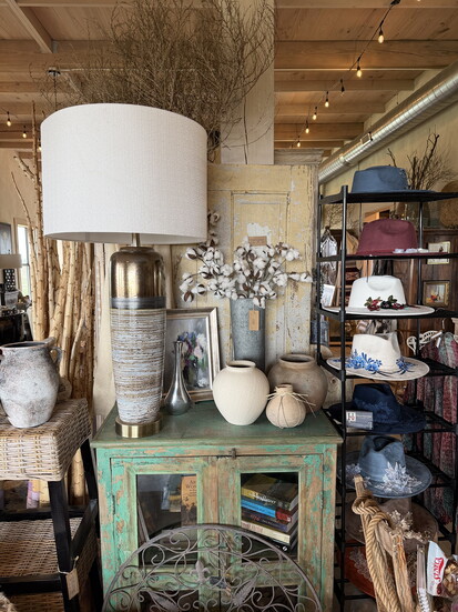Rustic materials and collected details define the interiors at Style 208.