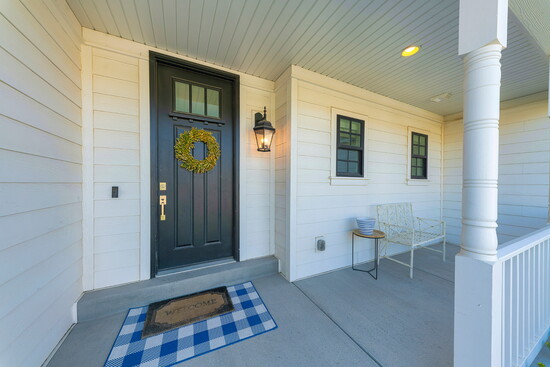 Front porch with doorbell camera.