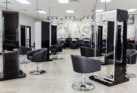 Inside Elevate Academy’s luxury salon environment, designed to give students direct, hands-on experience from day one.