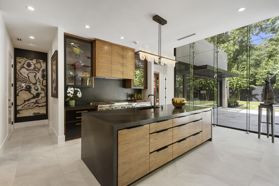 Contemporary walnut kitchen cabinetry at 15 Regent Square.