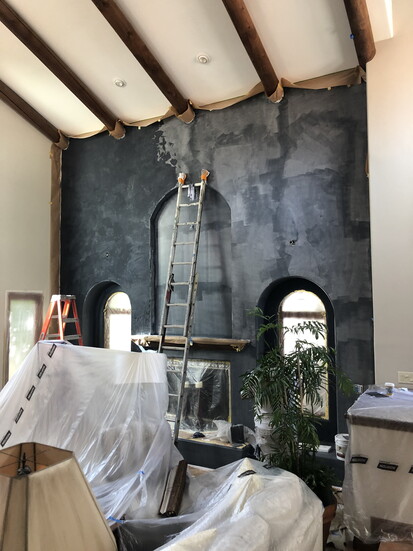 BEFORE: Adding contrast to a great room with a bold accent wall.