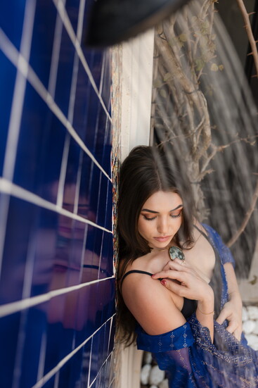 Wardrobe and environment work together to create one cohesive visual story instead of competing for attention.
