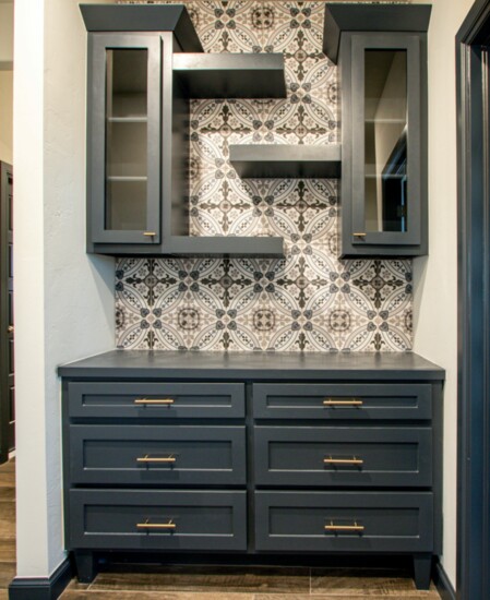 This artful hall cabinet allows for plenty of storage and space to showcase art or other items.