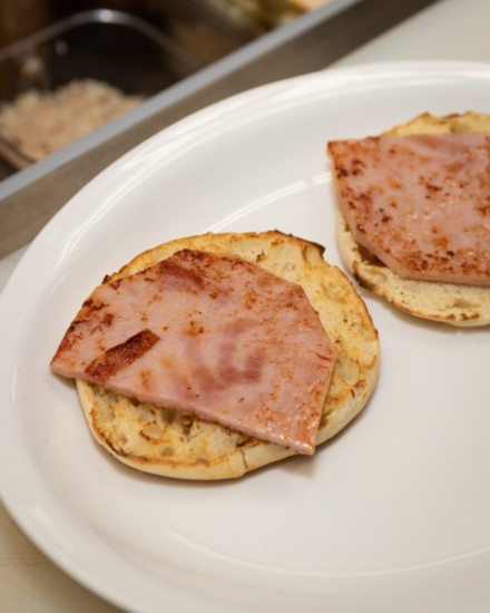 Step 1: English muffins covered with ham.