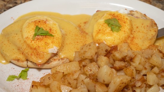 The finished dish: Cafe 393's Eggs Benedict with home fries.