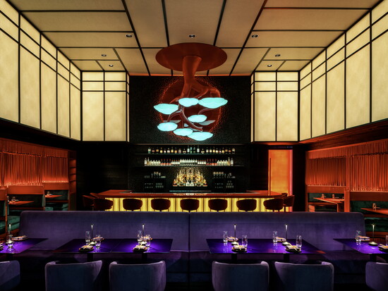 A sculptural bonsai tree hovers over the bar at Haii Keii.