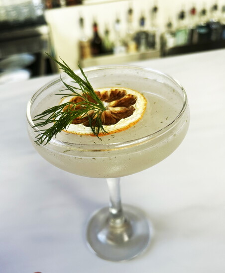 Dragon's Breath -- Singani, dragon fruit, aloe vera, lychee, lemon, and dill. Singani is a Bolivian pomace brandy.