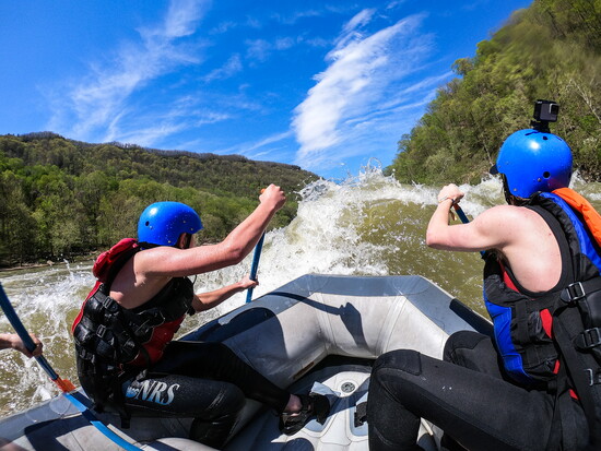 Paddling through a massive wave!