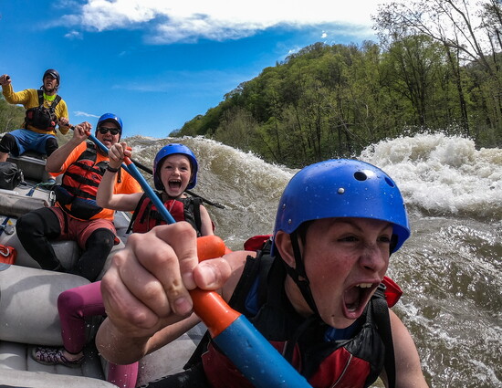 My son Milo roaring as we hit a rapid on the New River!