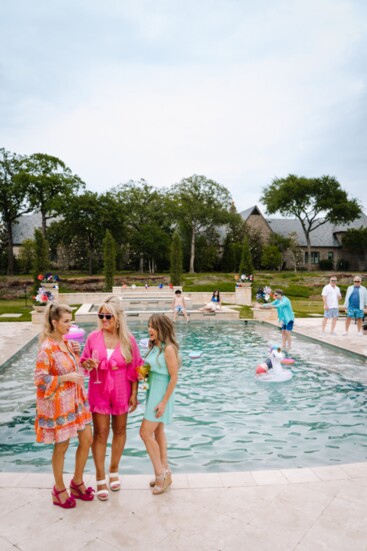 Pool Party celebrating the arrival of Summer in a gorgeous custom pool designed and built by Claffey Pools of Southlake