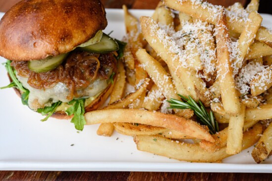 Brisket Burger - House Made Pickles, Caramelized Onion, Gruyere, Arugula, Mustard Aioli, Rosemary Parmesan Fries 