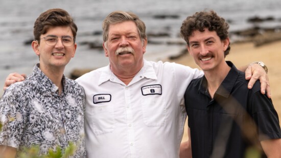 Bill McIntosh and his sons Michael and Scott enjoying the beach