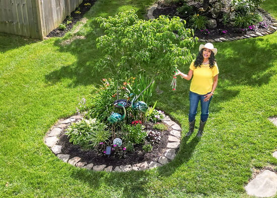 Towana Bowles is all smiles as she admires the fruits of her labor.