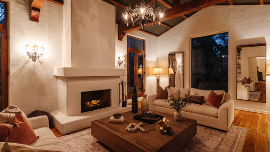 The living room of her recent Spanish-style listing Photography by Neau Focus