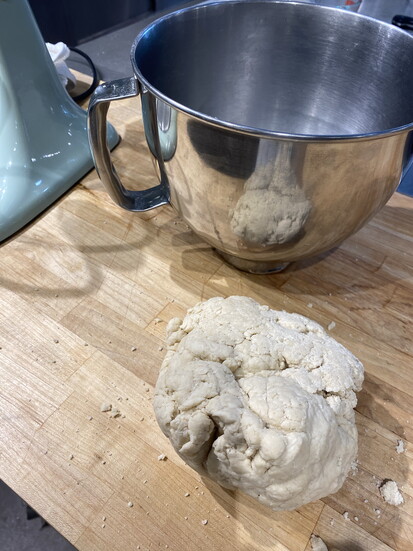 Starting the croissant pastry after the flour and water were added.